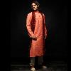 Ethnic Churidar With Orange Colored Printed Kameez