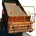 Tailboard Chipping Spreader with Feed Roller