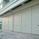 Motorized Rolling Shutter With Interlock