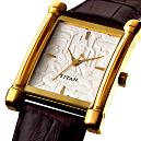 Titan Wrist Watches With Golden Case And White Dial