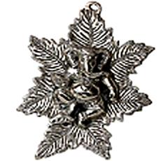 Ganpati Sculpture Crafted On White Metal Leaves